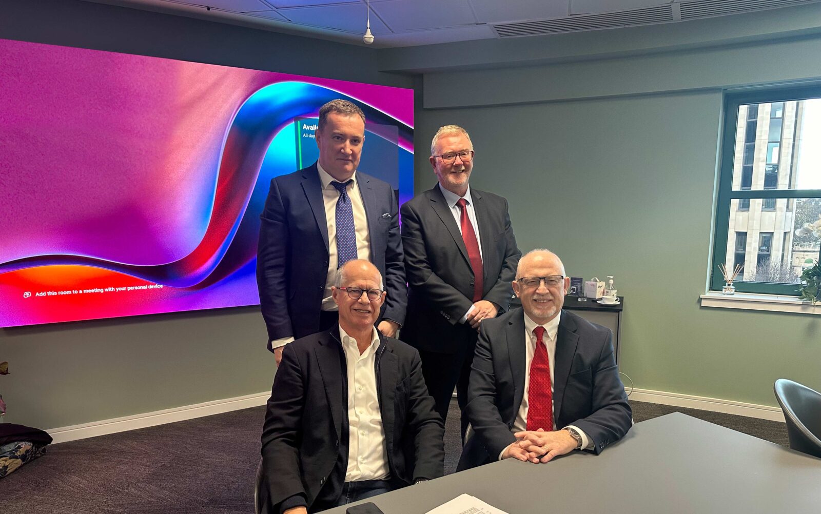 Image of Andrew Fleming of Antifriction Components, Tom Duncan of Scots Bearings, Alberto Bianchi of Gruppo Bianchi, and David Jackson of Scots Bearings